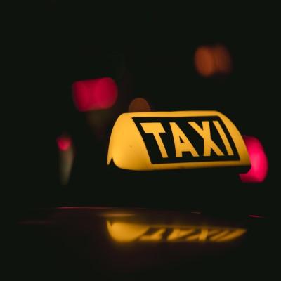 closeup-shot-taxi-sign-placed 400 x 400